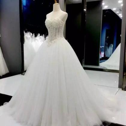 Sleeveless Illusion Corset Bodice Wedding Dress..