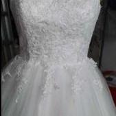 Sleeveless Lace Wedding Dress With Corset Back..