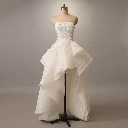 Strapless Ivory Asymmetric High Low Bridal Dress..